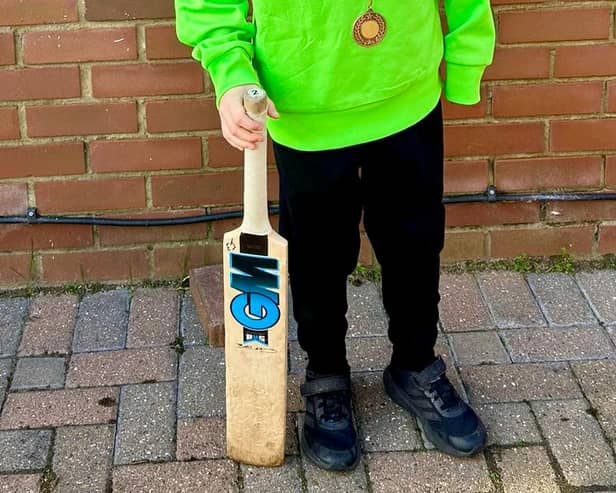 Cricket-loving schoolboy Ethan Johnson aged eight