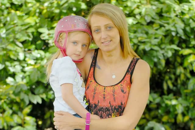 Jessica Bootes with mum Lisa in 2014, Jessica was left close to death with life changing brain injuries when a cabbie ploughed into the back of her parents car