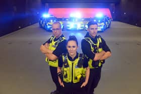 Motorway Cops stars Sgt Dave Roberts, constable Mary-Anne Hutchison and constable Jan Simlesa.