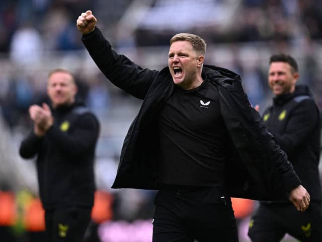 Newcastle United's English head coach Eddie Howe (C) celebrates on the pitch after the English Premier League football match between Newcastle United and West Ham United at St James' Park in Newcastle-upon-Tyne, north east England on March 30, 2024. Newcastle won the game 4-3. (Photo by Paul ELLIS / AFP)