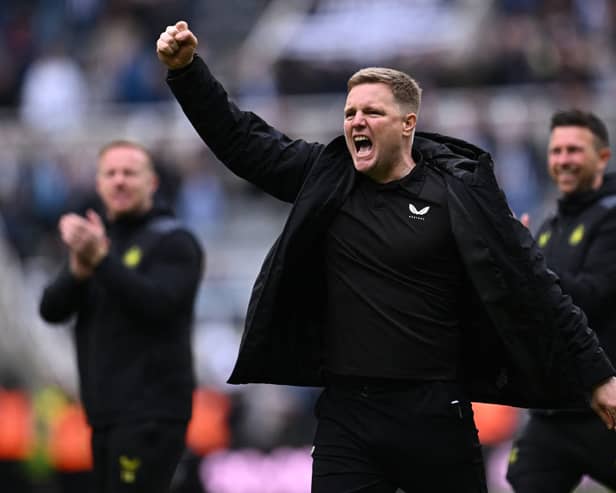 Newcastle United's English head coach Eddie Howe (C) celebrates on the pitch after the English Premier League football match between Newcastle United and West Ham United at St James' Park in Newcastle-upon-Tyne, north east England on March 30, 2024. Newcastle won the game 4-3. (Photo by Paul ELLIS / AFP)