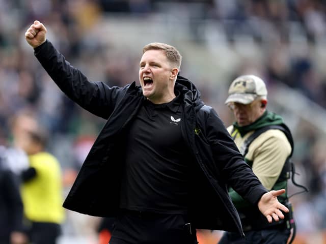 A jubilant Eddie Howe punches the air with glee at the full-time whistle