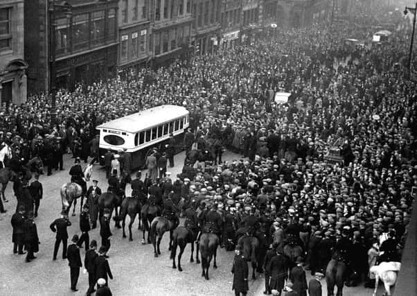 Mounted and foot officers engaged in policing the General Strike in 1926.