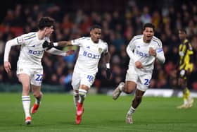 Crysencio Summerville of Leeds United celebrates scoring alongside Archie Gray and Georginio Rutter 
