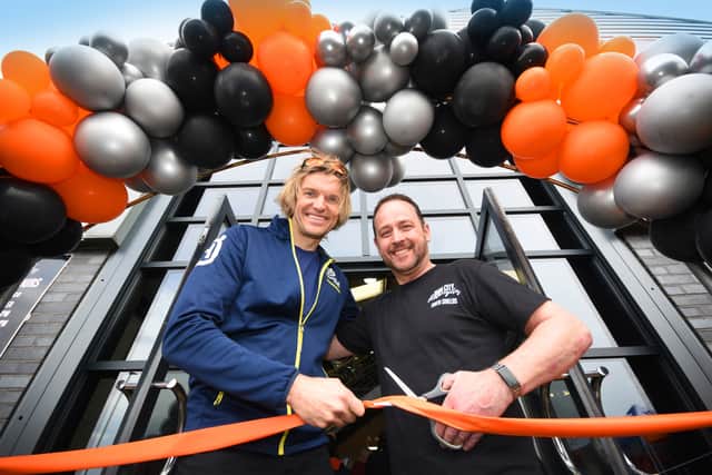 Lyndon Poskitt (left) and General Manager Richard White cutting the ceremonial ribbon at the opening of Iron City Motorcycles in South Tyneside. Photo: Ian Mcclelland Media.