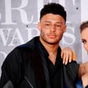 Former Liverpool midfielder Alex Oxlade-Chamberlain and his partner Perrie Edwards.