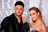 Former Liverpool midfielder Alex Oxlade-Chamberlain and his partner Perrie Edwards.