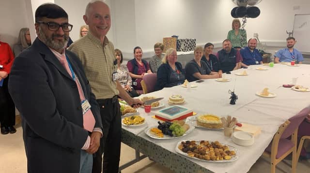 Dr Shaz Wahid, the Executive Medical Director of STSFT, with Dr Lance Cope and colleagues at his retirement celebration.