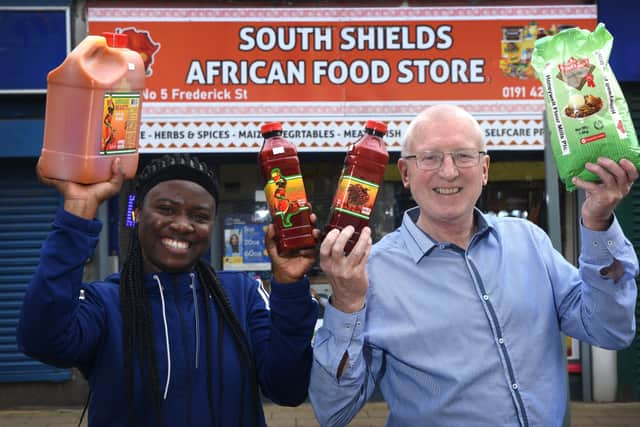 Mayowa Peace Akande, owner of the South Shields African Food Store, and Bill Hartshorne, a TEDCO business advisor. Photo: Ian Mcclelland Media.