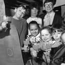 Pupils from Marsden Junior Mixed School at a 'Thank You' reception held in the Centurion restaurant, with teacher Marjorie Woodmass, right, waitress Linda Arnold and proprietor John Warcup. Class 2 decorated the restaurant for it's opening with Roman soldier figures and murals.