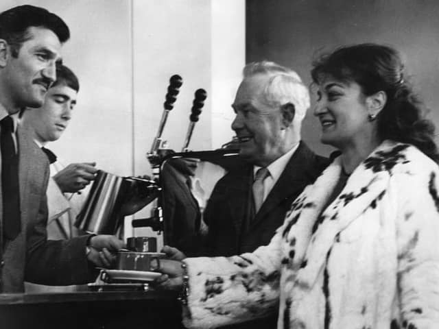 A November 1966 photo showing the new bar at Wouldhave House with Lennard May - South Shields entertainments official - and Mrs Franchi being served coffee by Michael Franchi