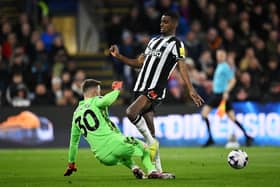 Alexander Isak of Newcastle United is challenged by Dean Henderson of Crystal Palace during the Premier League match between Crystal Palace and Newcastle United at Selhurst Park on April 24, 2024 in London, England. (Photo by Justin Setterfield/Getty Images)