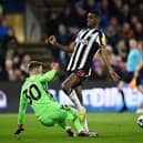 Alexander Isak of Newcastle United is challenged by Dean Henderson of Crystal Palace during the Premier League match between Crystal Palace and Newcastle United at Selhurst Park on April 24, 2024 in London, England. (Photo by Justin Setterfield/Getty Images)