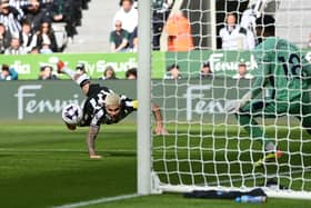 Bruno Guimaraes scored with a diving header to put Newcastle United in front.