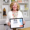 Sue Balfour, CEO of Katy Sue Designs with award