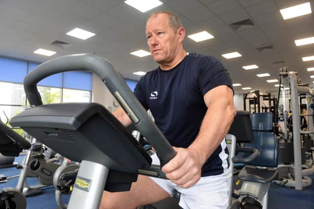 David Cook starting his cycling challenge to raise £5,000 for his 11-year-old nephew who has muscular dystrophy in order to buy an all-terrain wheelchair.