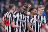 Alexander Isak of Newcastle United celebrates scoring his team's fourth goal with teammates Sean Longstaff, Jacob Murphy and Anthony Gordon during the Premier League match between Burnley FC and Newcastle United at Turf Moor on May 04, 2024 in Burnley, England. (Photo by Stu Forster/Getty Images)