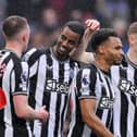 Alexander Isak of Newcastle United celebrates scoring his team's fourth goal with teammates Sean Longstaff, Jacob Murphy and Anthony Gordon during the Premier League match between Burnley FC and Newcastle United at Turf Moor on May 04, 2024 in Burnley, England. (Photo by Stu Forster/Getty Images)