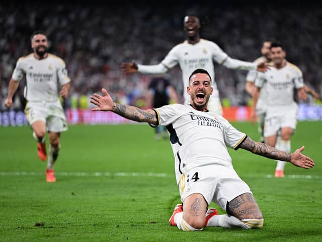 Joselu of Real Madrid celebrates scoring his team's second goal during the UEFA Champions League semi-final second leg match between Real Madrid and FC Bayern MÃ¼nchen at Estadio Santiago Bernabeu on May 08, 2024 in Madrid, Spain. (Photo by David Ramos/Getty Images)