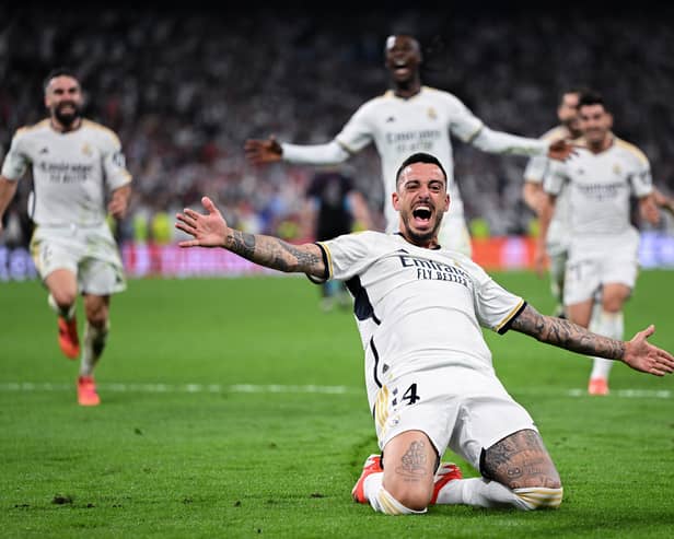 Joselu of Real Madrid celebrates scoring his team's second goal during the UEFA Champions League semi-final second leg match between Real Madrid and FC Bayern MÃ¼nchen at Estadio Santiago Bernabeu on May 08, 2024 in Madrid, Spain. (Photo by David Ramos/Getty Images)