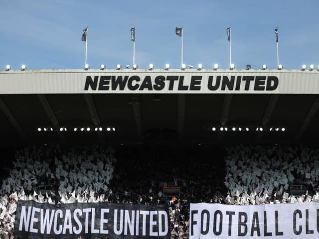 Fans of Newcastle United show their support with banners and flags prior to the Premier League match between Newcastle United and Brighton & Hove Albion at St. James Park on May 11, 2024 in Newcastle upon Tyne, England. (Photo by George Wood/Getty Images)