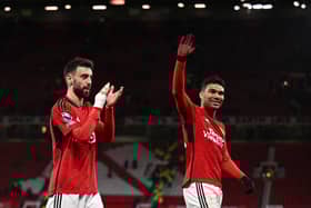 Bruno Fernandes Casemiro applaud the Manchester United fans. 