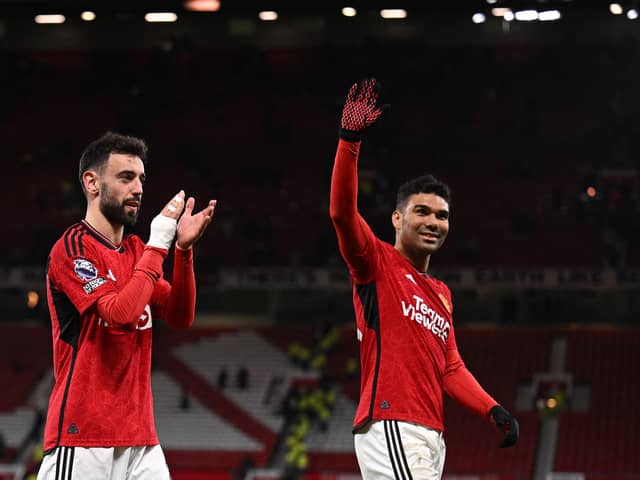 Bruno Fernandes Casemiro applaud the Manchester United fans. 