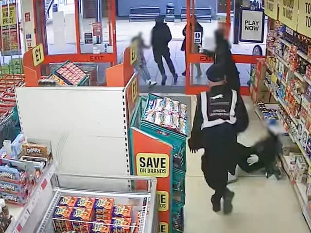 This is the shocking moment a prolific shoplifter barged over two elderly woman after stealing frozen lamb from Iceland.  