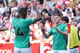 Harvey Barnes of Newcastle United celebrates scoring his team's first goal with teammate Alexander Isak during the Premier League match between Brentford FC and Newcastle United at Brentford Community Stadium on May 19, 2024 in Brentford, England. (Photo by Eddie Keogh/Getty Images)