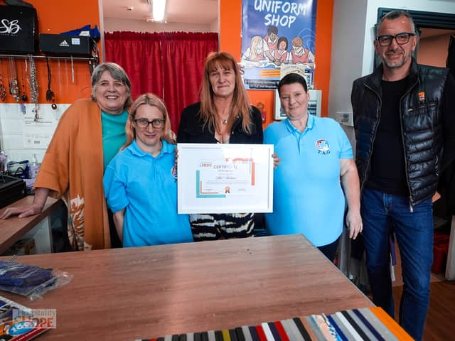 Shel, H&H Operations Director Carol Gorman, Peter Maloney and Shop Volunteers