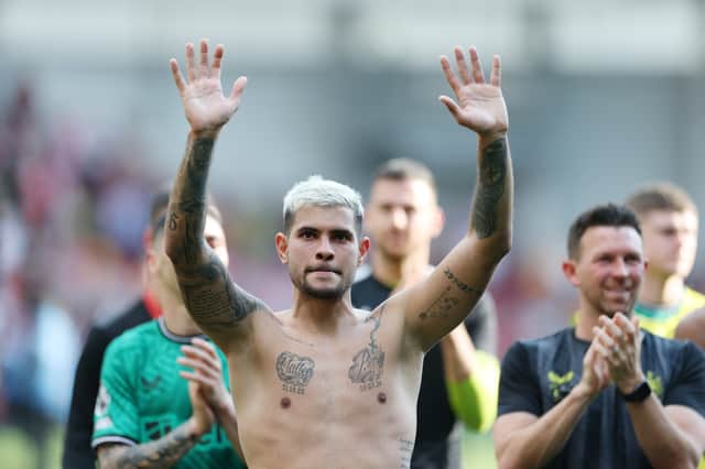 Bruno Guimaraes waves to the Newcastle United supporters following the 4-2 win over Brentford