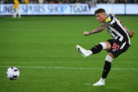 Harrison Ashby takes a penalty for Newcastle United against Tottenham Hotspur. 