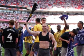 Ryan Fraser of Southampton celebrates victory with teammates, after Southampton secure promotion to the Premier League after defeating Leeds United during the Sky Bet Championship Play Final match between Leeds United and Southampton at Wembley Stadium on May 26, 2024 in London, England. (Photo by Alex Pantling/Getty Images)
