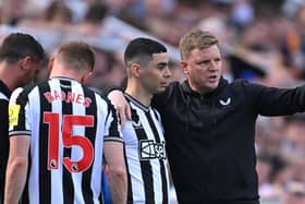 Miguel Almiron and Eddie Howe. 