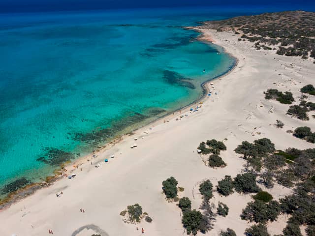 UK holidaymakers could face a £850 fine over a little known rule on Lalaria beach in Skiathos - featured in the film Mamma Mia! (Photo: AFP via Getty Images)