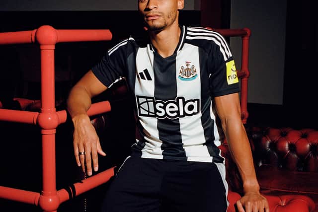 Newcastle United winger Jacob Murphy modelling the new home shirt. 