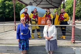 The Mayor and Mayoress of South Tyneside in front of the Tynemouth RNLI crew. The crew are holding the case which houses the scroll marking the 200th anniversary of the RNLI. Photo: National World.