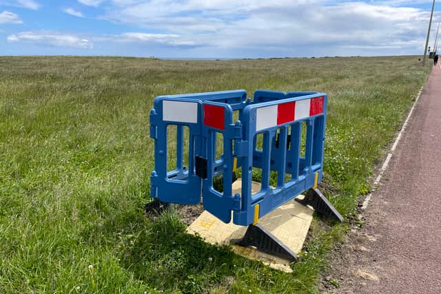 Holes have been drilled in The Leas to install the new lighting. It is understood that the National Trust, who own and manage The Leas, managed to get the work paused.