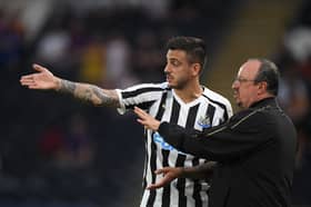 Rafa Benitez and Joselu during their time at Newcastle United.