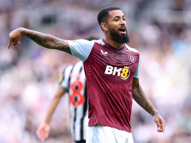Aston Villa midfielder Douglas Luiz in action against Newcastle United. Luiz is set to move to Juventus in a swap deal.