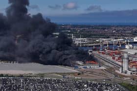 The flames appear to be engulfing a Port of Tyne warehouse.