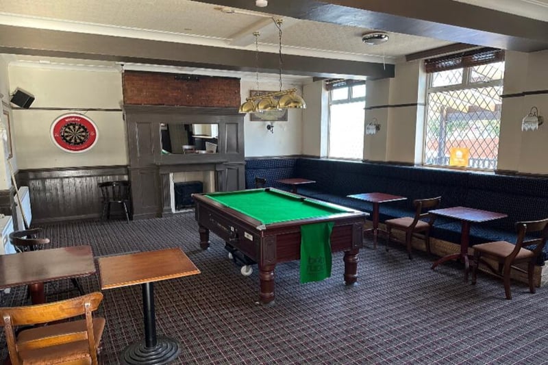 Just off the main bar area is a games room with a pool table and dart board.