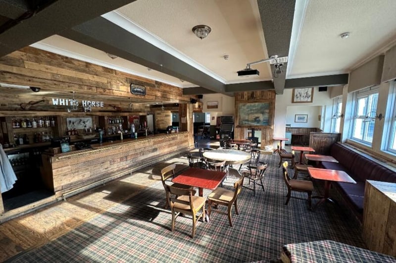 The main bar area features a timber fronted bar servery and can fit around 30 people on fixed perimeter seating and chairs.
