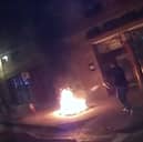 Fires burn outside London shops as police race to extinguish blazes.