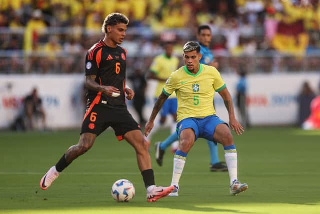 Bruno Guimaraes of Brazil defends against Richard Rios of Colombia during the CONMEBOL Copa America 2024 Group D match between Brazil and Colombia at Levi's Stadium on July 02, 2024 in Santa Clara, California. (Photo by Ezra Shaw/Getty Images)