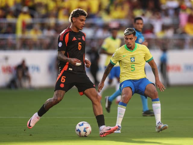 Bruno Guimaraes of Brazil defends against Richard Rios of Colombia during the CONMEBOL Copa America 2024 Group D match between Brazil and Colombia at Levi's Stadium on July 02, 2024 in Santa Clara, California. (Photo by Ezra Shaw/Getty Images)