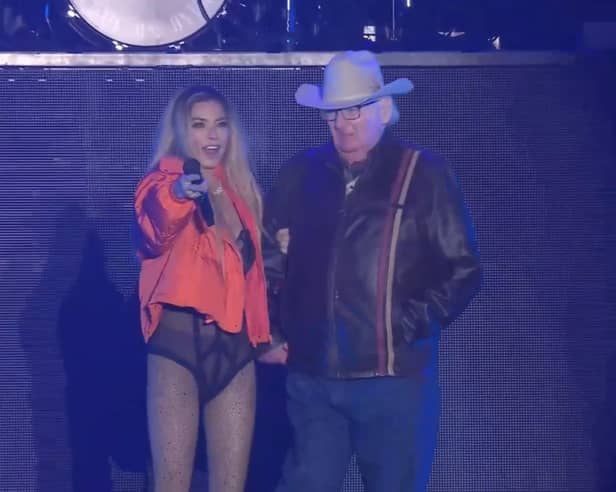 Shania Twain invites 81 year old superfan, Ken, on stage during her set at Lytham Festival.