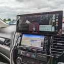 Dash-mounted screens add modern infotainment to any car