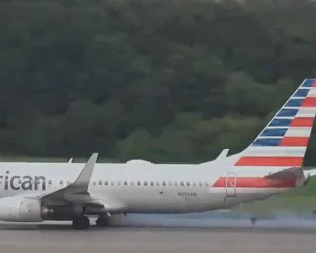 Boeing 737’s tyre explodes, flinging rubber across the runway.