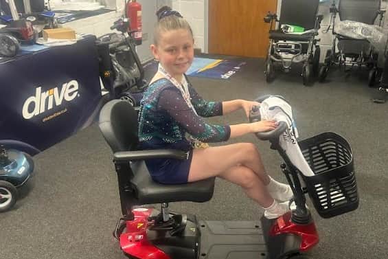 Amelia O'Connor with her medals at Mobility Care Solutions. Submitted picture.